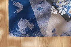 Kusový koberec Agnella Tempo Hidan Strieborný (s lemom)